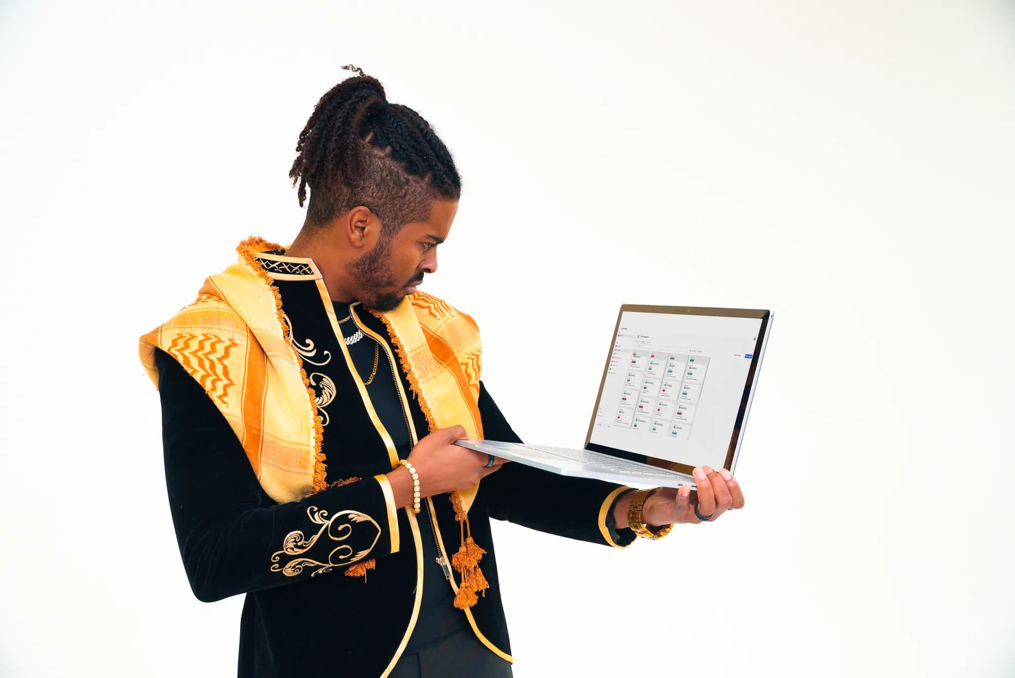 An Agency AF team member studying a dashboard on an open laptop.
