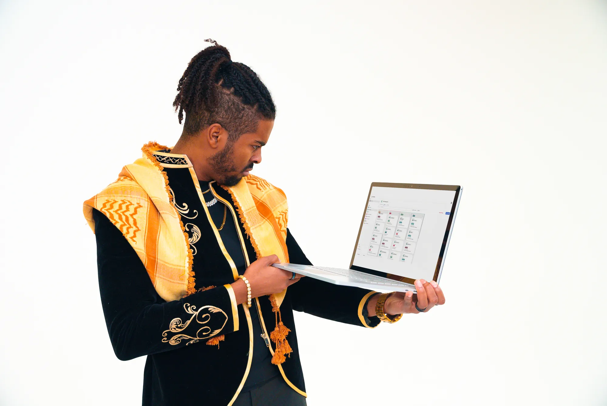An Agency AF team member studying a dashboard on an open laptop.